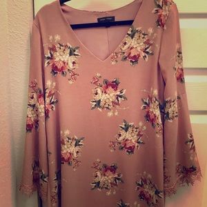 Flowy, pink dress with bell sleeves